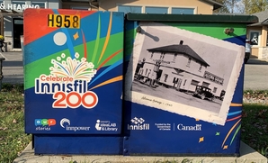 Image of a utility box featuring the Celebrate Innisfil 200 logo and an image of the Alcona Garage